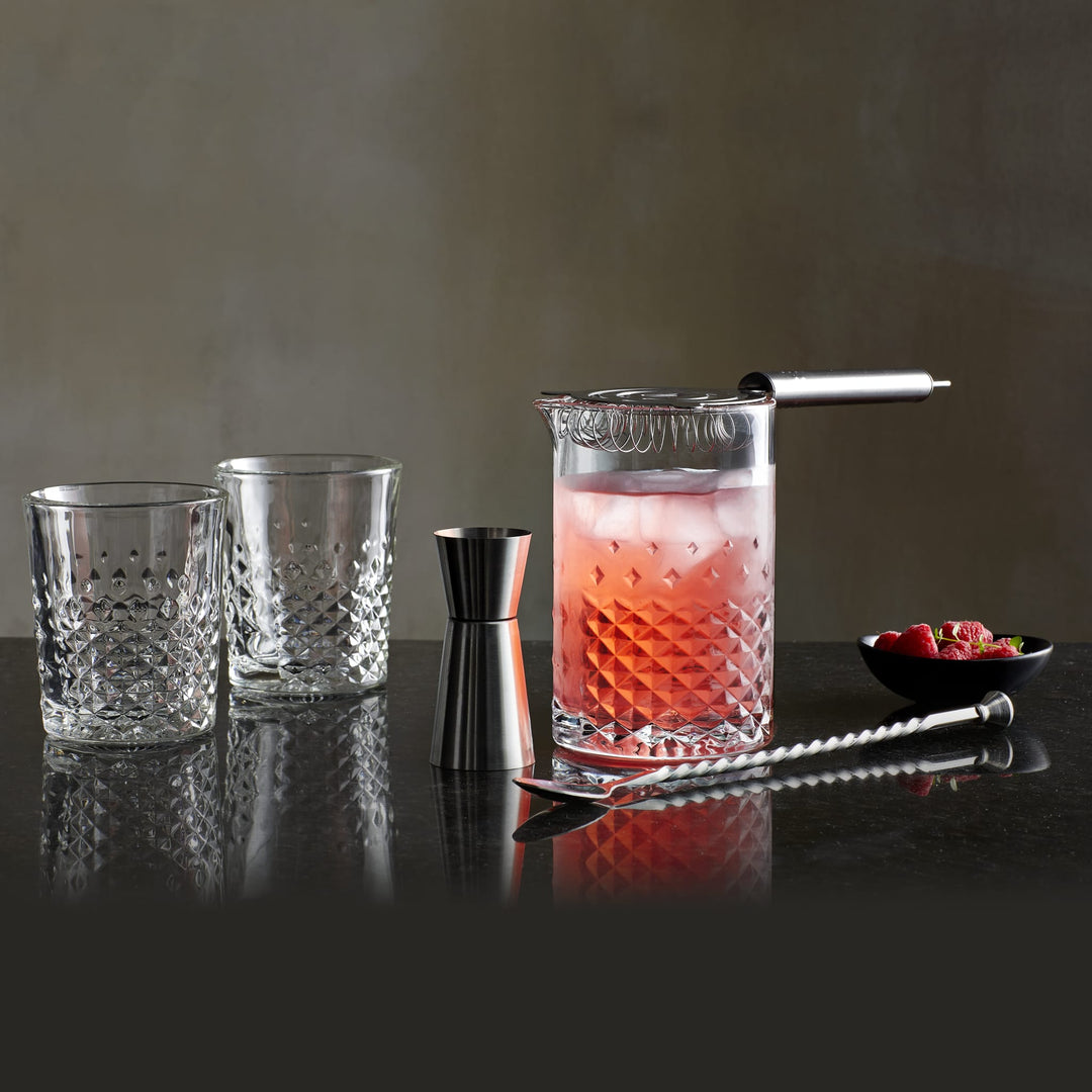 Includes 25.5-ounce stirring glass (4.1-inch diameter by 5.8-inch height), stainless steel strainer, satin finish jigger (1.7-inch diameter by 3.35-inch height) and mirror-finish long stirring spoon