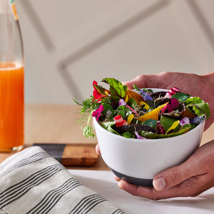 Details like high walls, unexpected angles and a smooth, speckled surface add contemporary flair