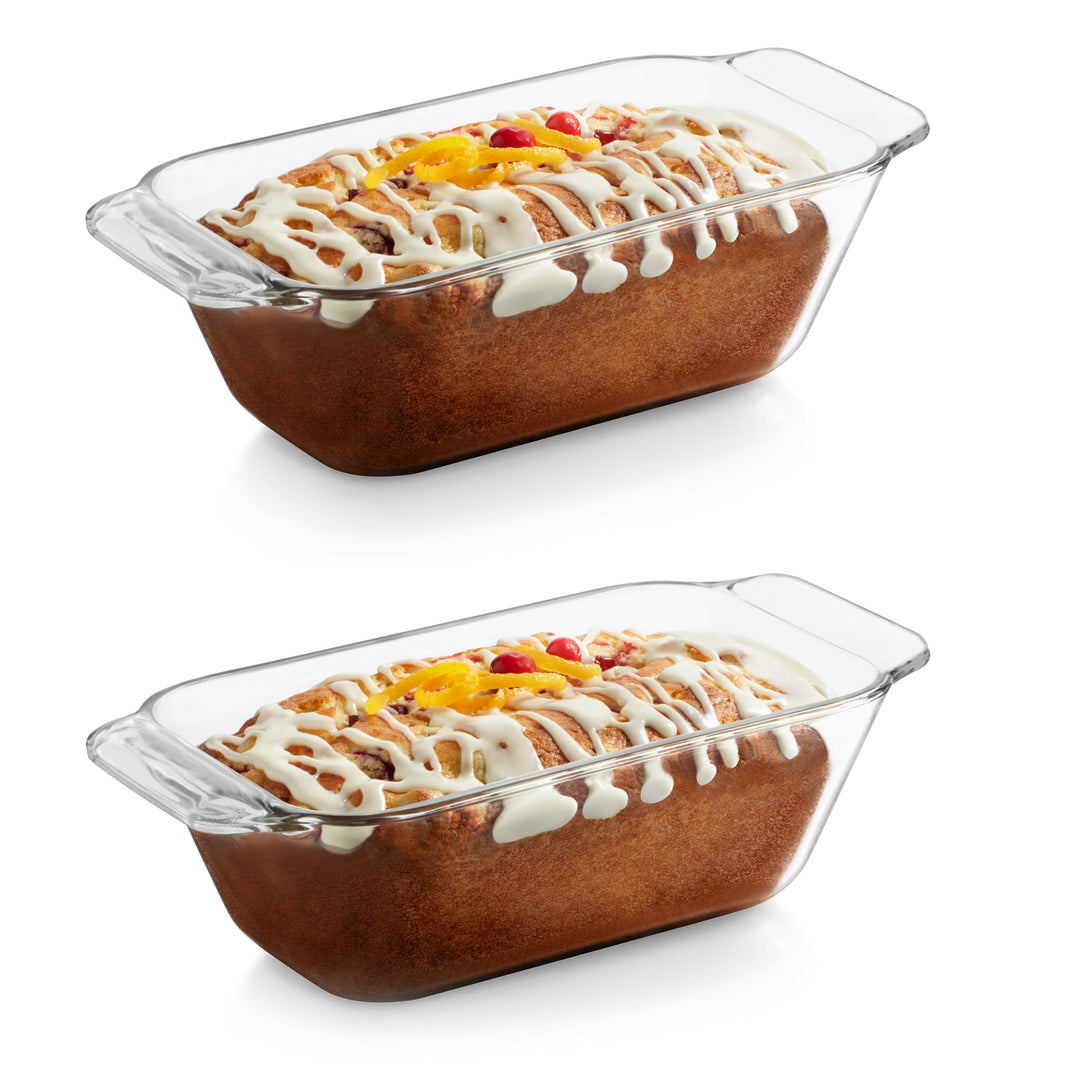 Includes two clear glass loaf baking dishes designed to nest and stack together for space-saving storage.