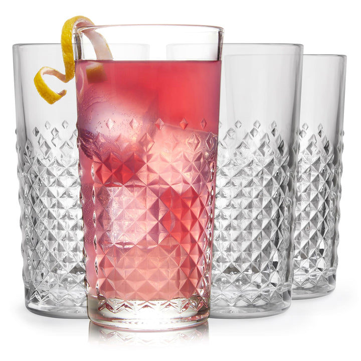 Serve cocktails, soda and non-alcoholic mixed drinks in this tumbler whose faceted design reflects light