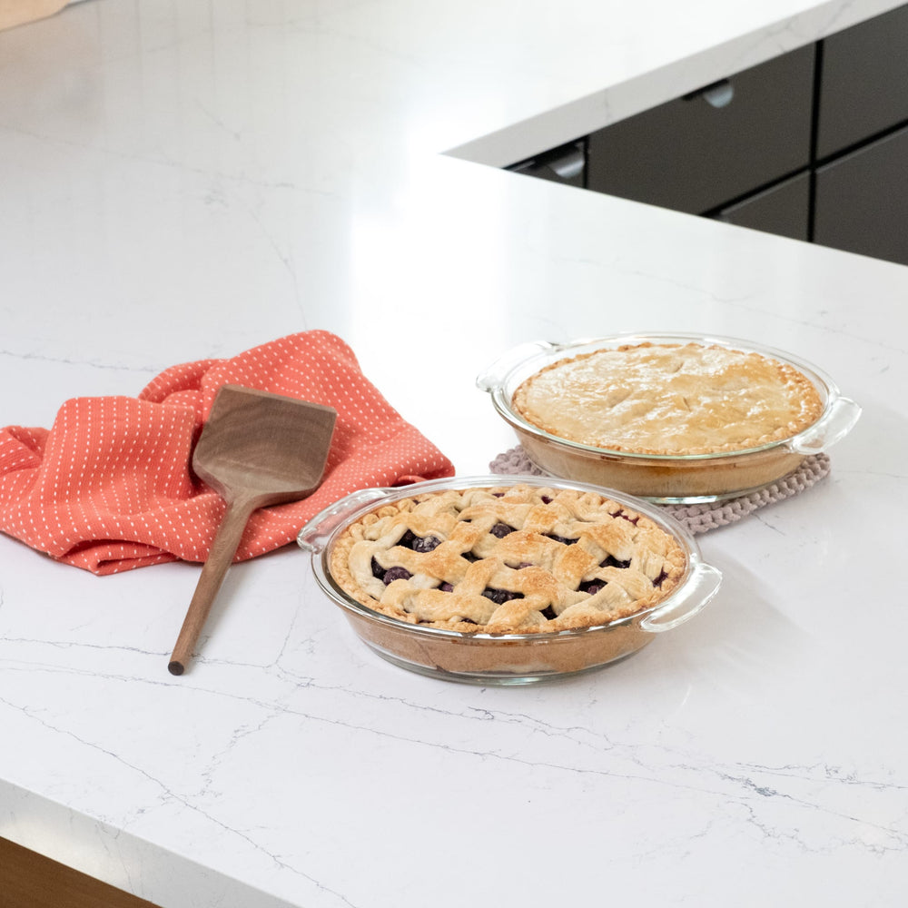 Trademarked GreatGrip™ handles provide a safe, comfortable hold from oven to table.