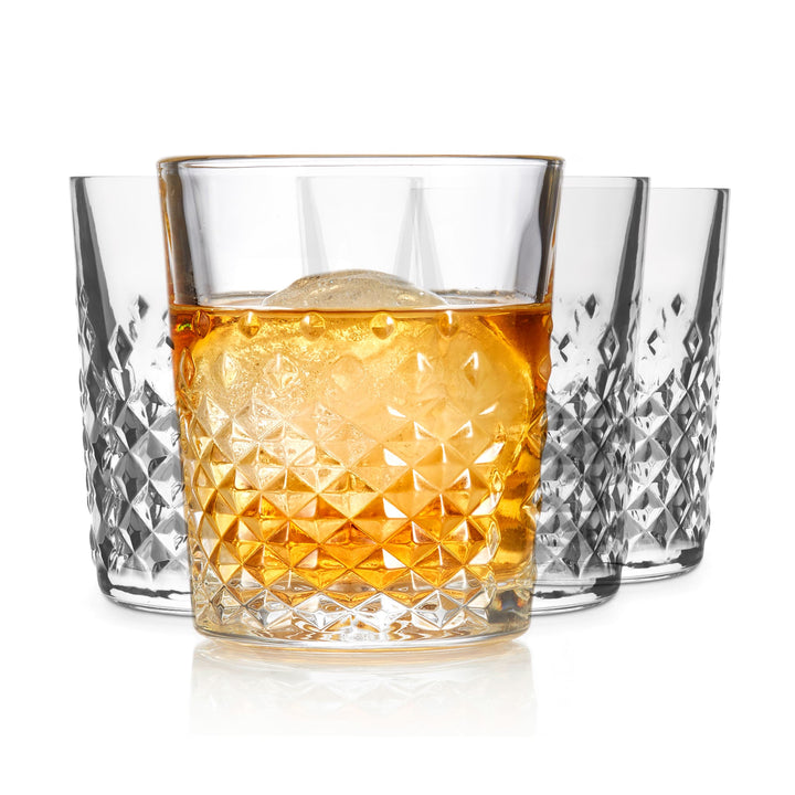 Serve cocktails, spirits and non-alcoholic mixed drinks in this double old-fashioned glass whose faceted design reflects light