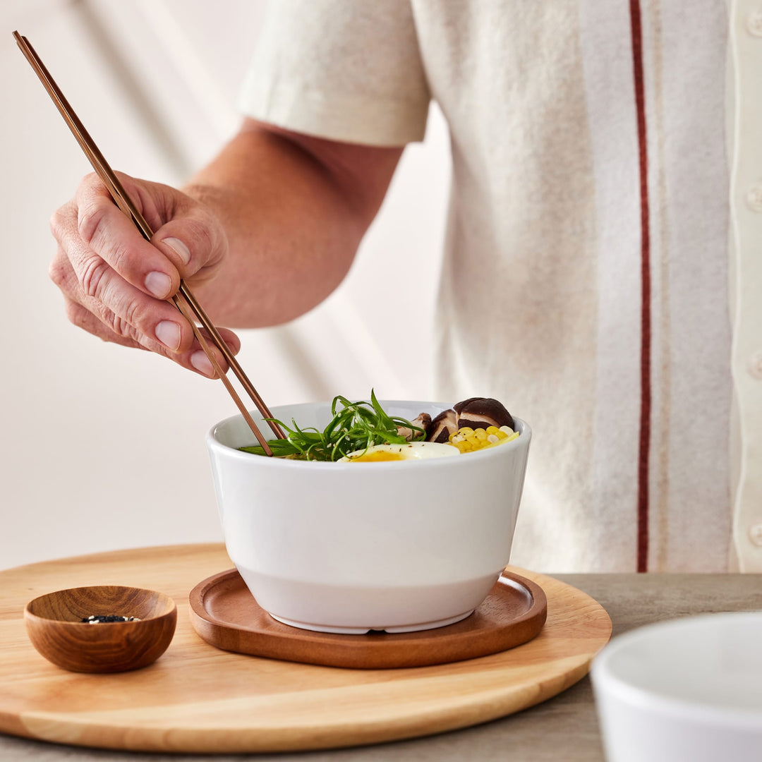 Details like high walls, unexpected angles and a smooth, speckled surface add contemporary flair