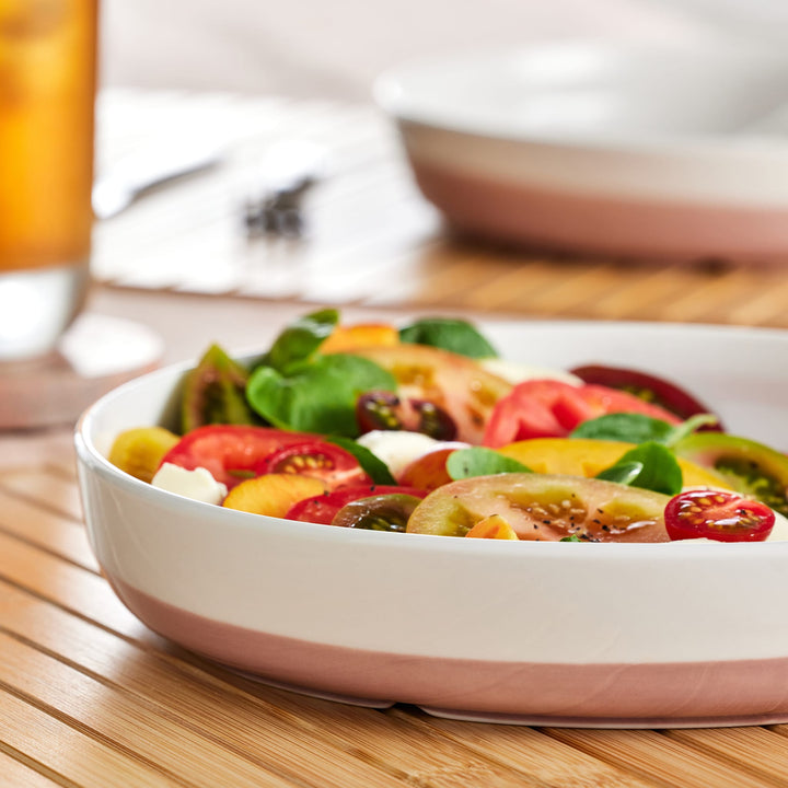 Details like high walls, unexpected angles and a smooth, speckled surface add contemporary flair