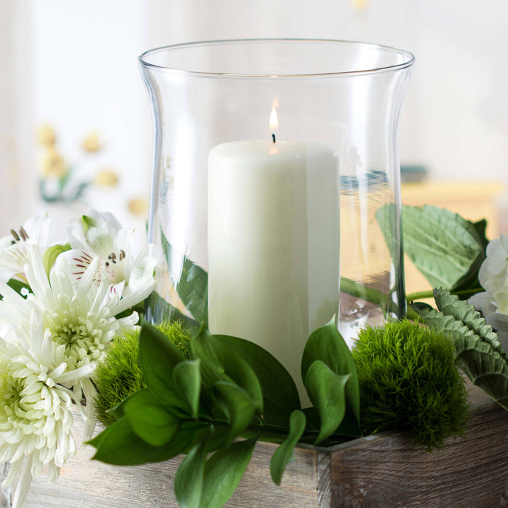 Includes 4, 6-inch glass vases/holders