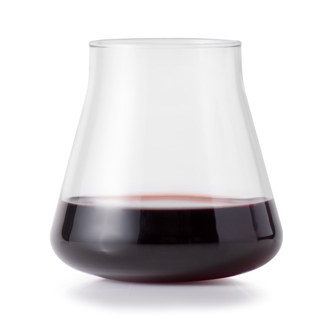 Elevate your tabletop with the striking silhouette of Magnitude stemless glassware, featuring a versatile, angular, tulip-shaped bowl for your wine, mixed drinks, water, or soda