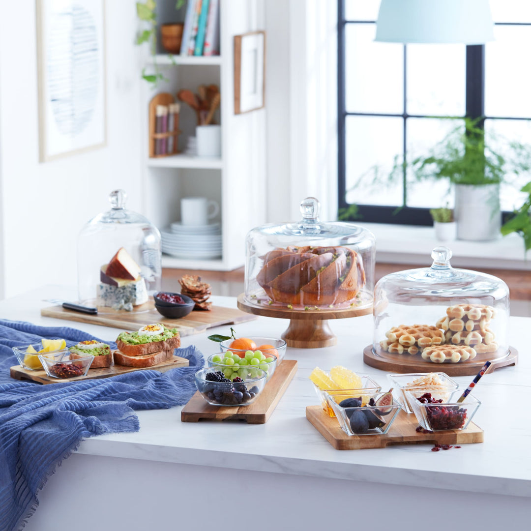 Glass dome made lead-free and should be washed by hand; wood serving board can be wiped down with a damp cloth