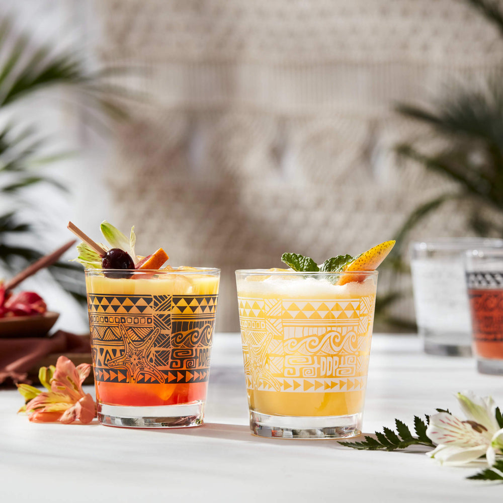Tropical themed rocks glass designed by legendary Tiki bartender Daniele Dalla Pola features a double-sided white tiki design, perfect for serving your favorite mai tai, mixed drink or mocktail