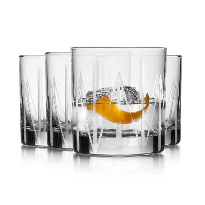 Inspired by Art Deco influences, this cut glassware set is a modern take on classic style and the perfect accent for dinner parties, cocktail hours, or everyday use