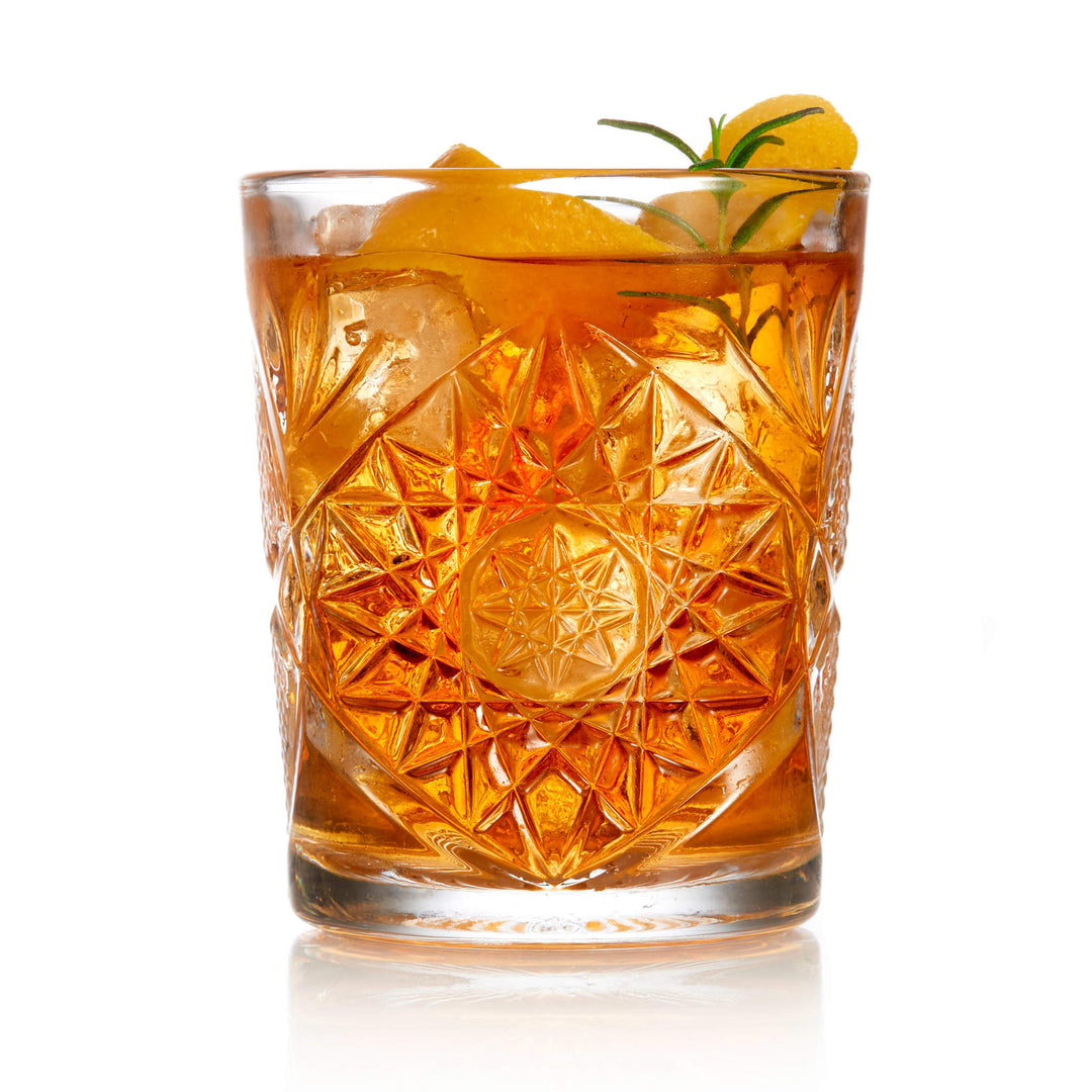 Serve cocktails, spirits and non-alcoholic mixed drinks in this double old-fashioned glass featuring classic hob and star design