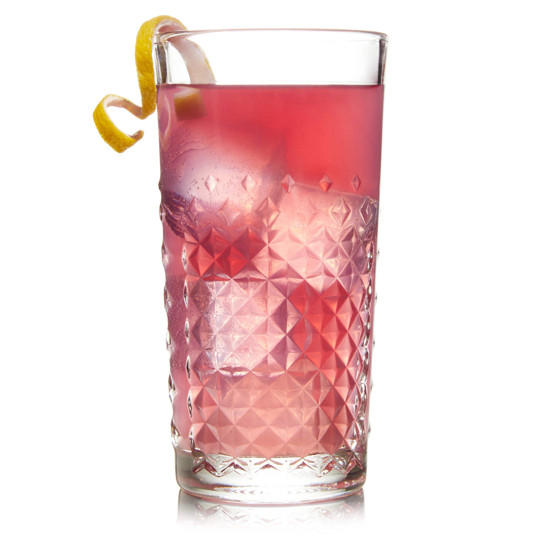 Serve cocktails, soda and non-alcoholic mixed drinks in this tumbler whose faceted design reflects light