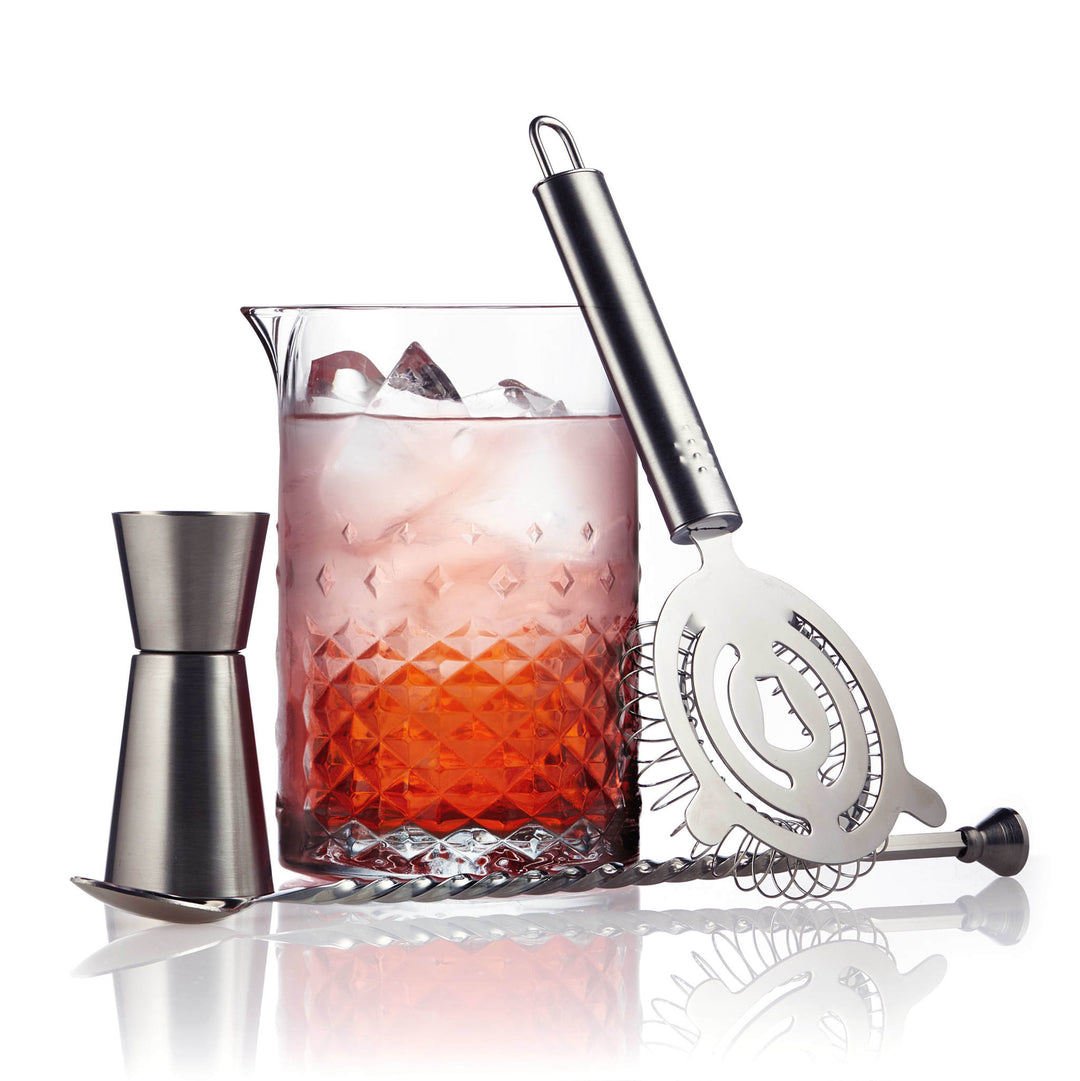 Craft and serve cocktails like the pros with this four-piece mixing set, a display-worthy addition to your home bar