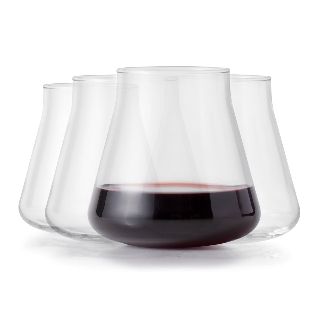 Elevate your tabletop with the striking silhouette of Magnitude stemless glassware, featuring a versatile, angular, tulip-shaped bowl for your wine, mixed drinks, water, or soda