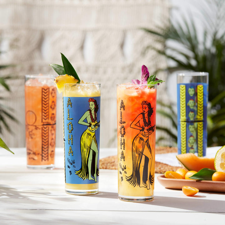 Tall and sleek zombie glass designed by legendary Tiki bartender, Daniele Dalla Pola, features a double-sided black and white tiki design, perfect for serving your favorite mixed drink or mocktail