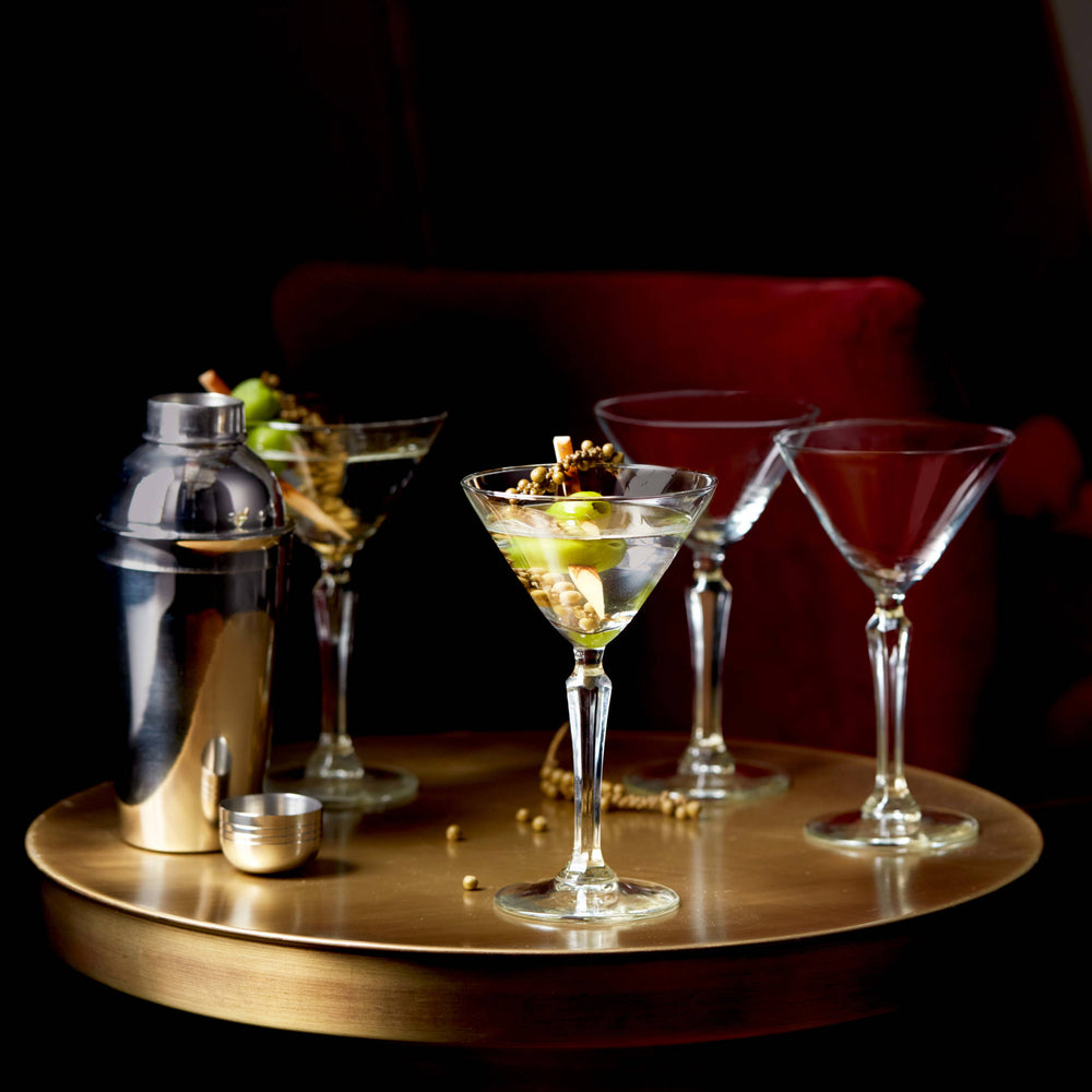 Complete martini glass set includes a classic shaker to make entertaining easy