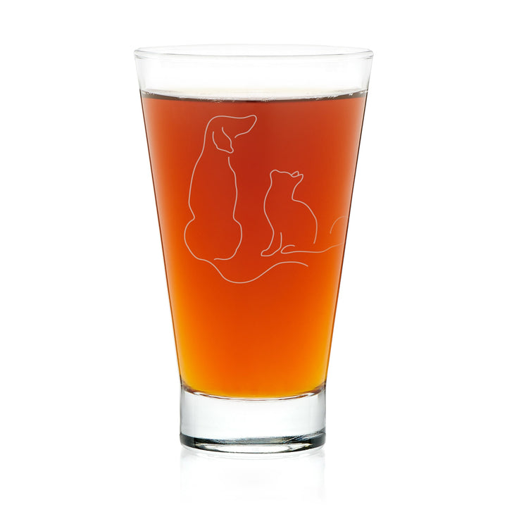 Versatile highball glass features sophisticated dog and cat illustration and is perfect for serving cocktails, water, soda, smoothies and more