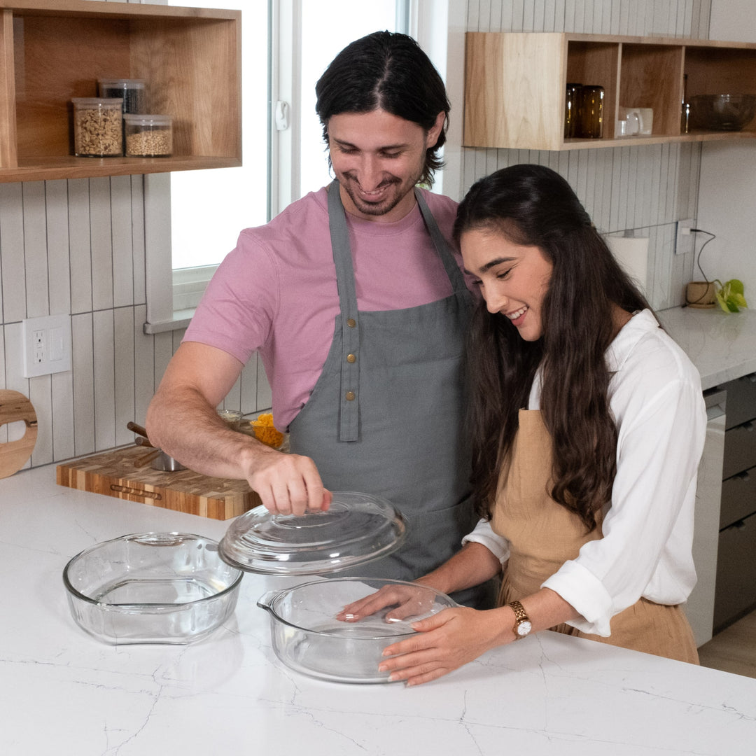 Includes 1, oval bake dish: 15.3-inch length by 10.6-inch width by 2.7-inch tall (139 oz, 4.3 qt) and 1, round casserole dish with glass cover: 9.88-inch width by 3-inch tall (102 oz, 3 qt)