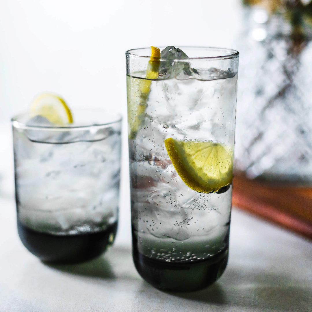 Polished multi-purpose smoke-colored glasses ideal for serving gin and tonics and old fashioned cocktails or for everyday refreshments including chilled water and soft drinks