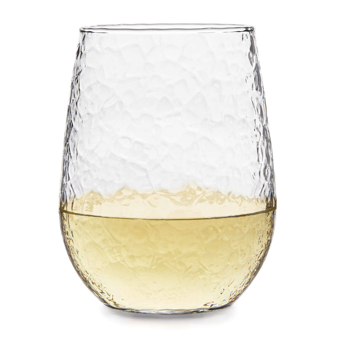 Hammered design creates a mesmerizing reflection when light shines through the stemless wine glass