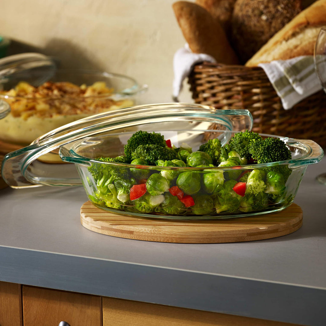 Oval, clear glass sides and cover let you monitor baking and serve your creation in style